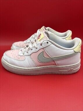 Youth 5.5 Nike Air Force 1 Low in pink And white leather and gold accents